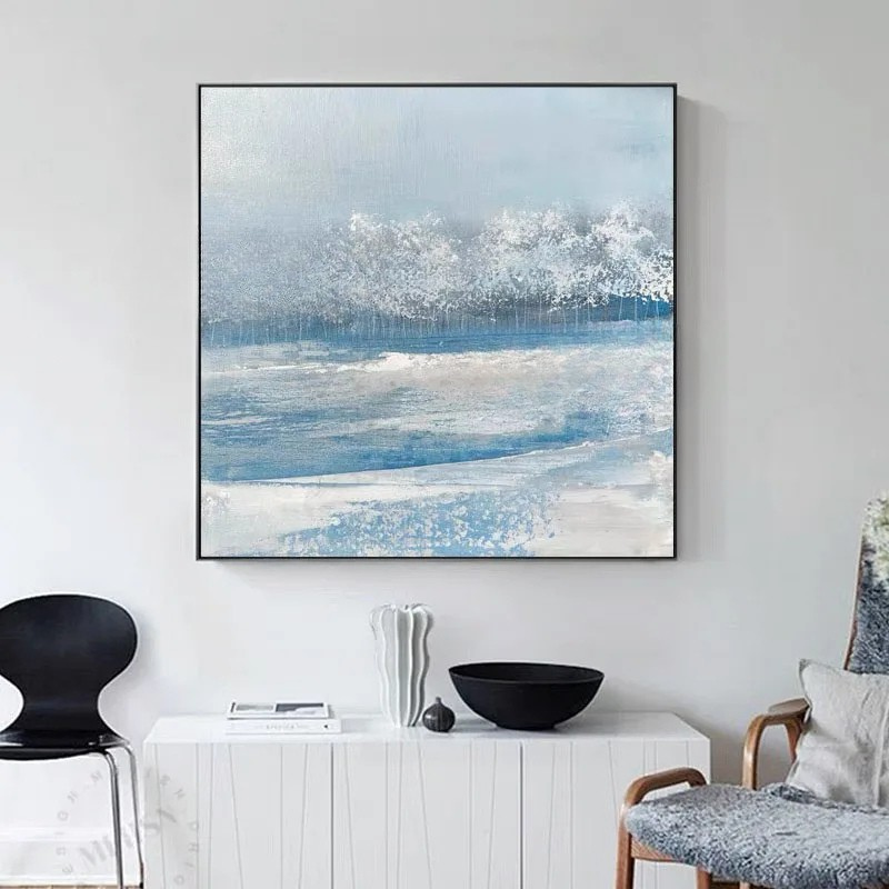 Abstract ocean painting in a modern living room setting
